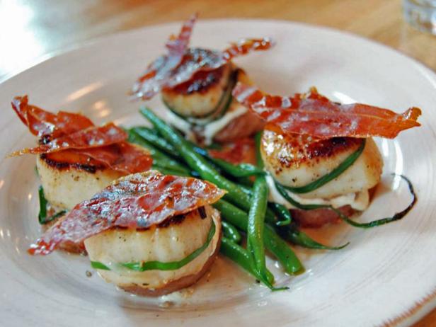 229 Parks Restaurant and Tavern signature dishes The menu is ever-changing based on seasonal availability, featuring dishes like rosemary-skewered Alaskan halibut and prosciutto-wrapped rack of elk.